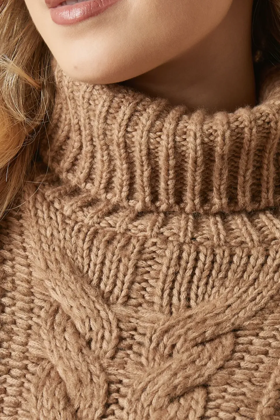 Chunky Cable Knit Roll Neck High Low Hem Jumper