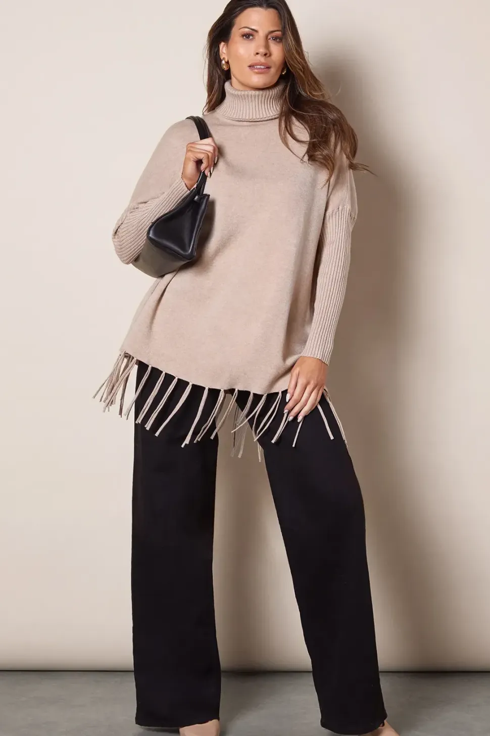Fringed Hem Roll Neck Poncho