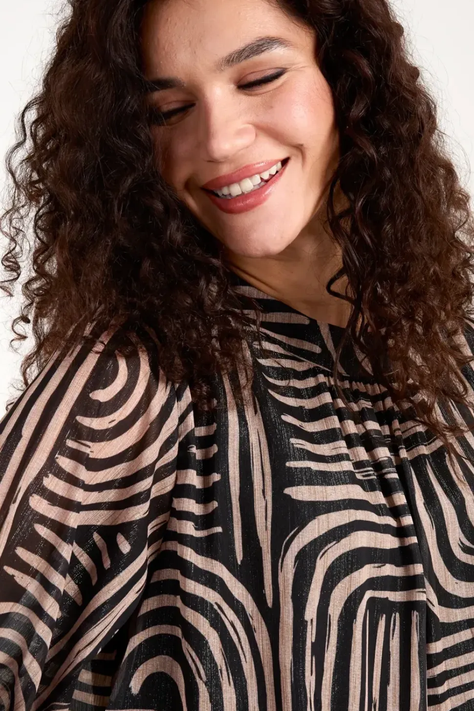 Geo Swirl Bubble Hem Top