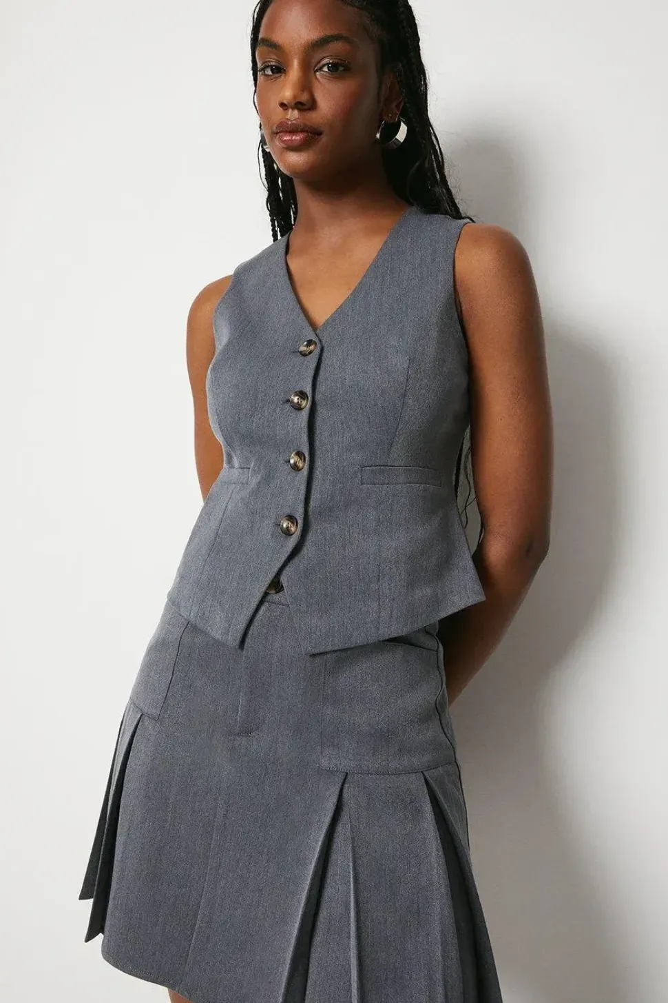 Kick Pleat Tailored Mini Skirt