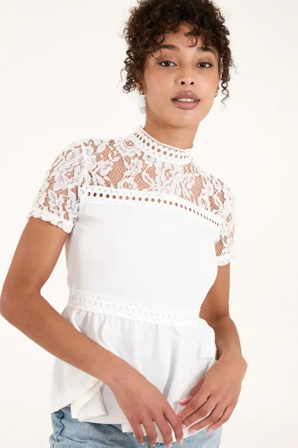 Lace Trimmed Peplum Top