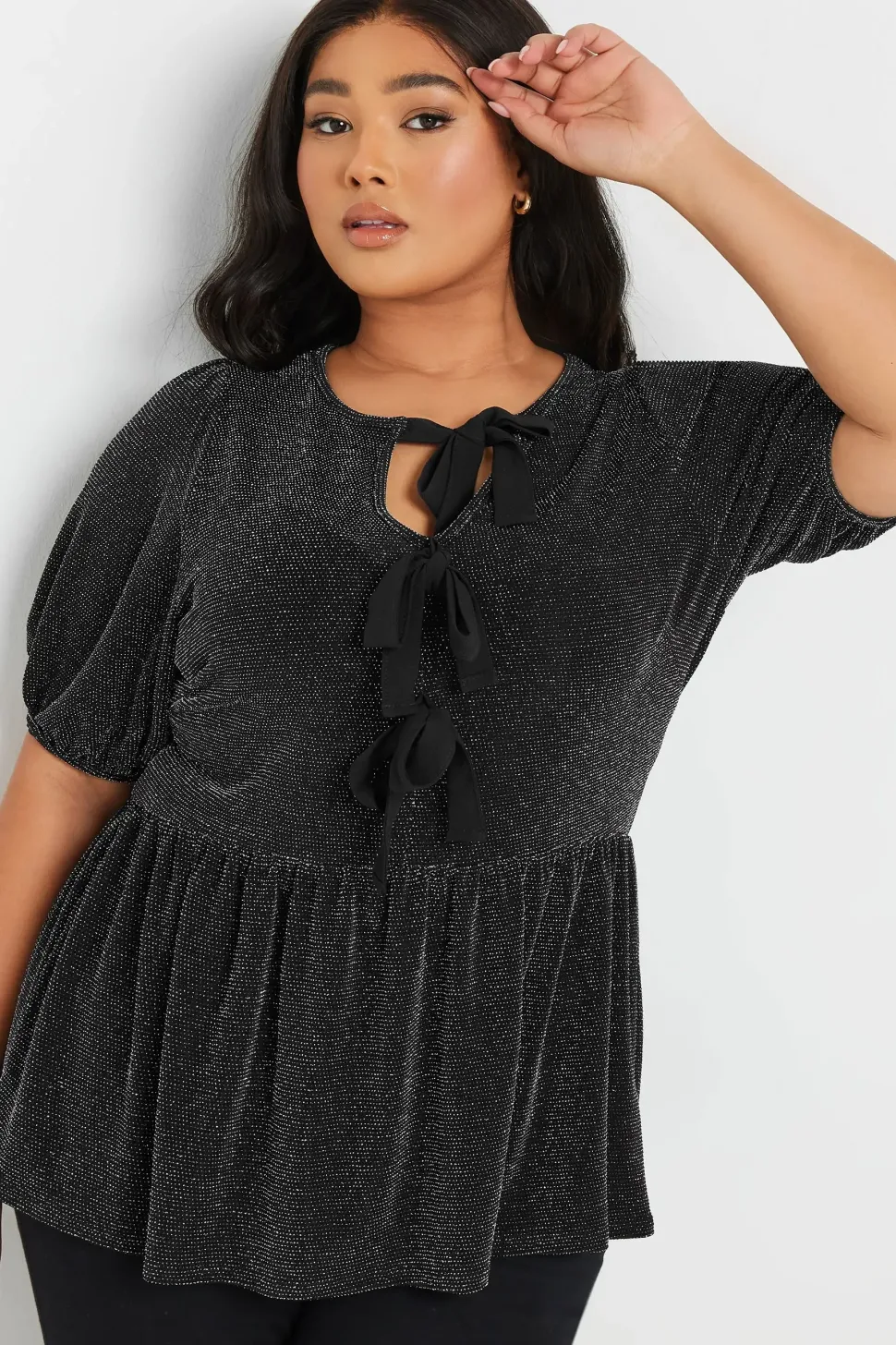 Metallic Bow Front Peplum Top