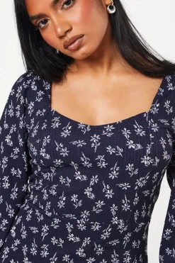 Petite Navy Ditsy Ruffle Hem Mini Dress