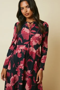 Pink large floral tie front hanky hem dress