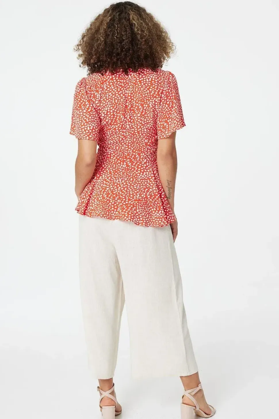 Polka Dot Peplum Blouse
