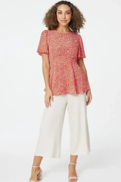 Polka Dot Peplum Blouse