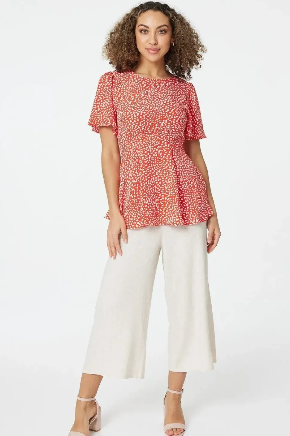 Polka Dot Peplum Blouse