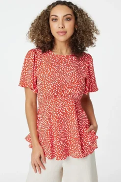 Polka Dot Peplum Blouse