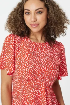 Polka Dot Peplum Blouse