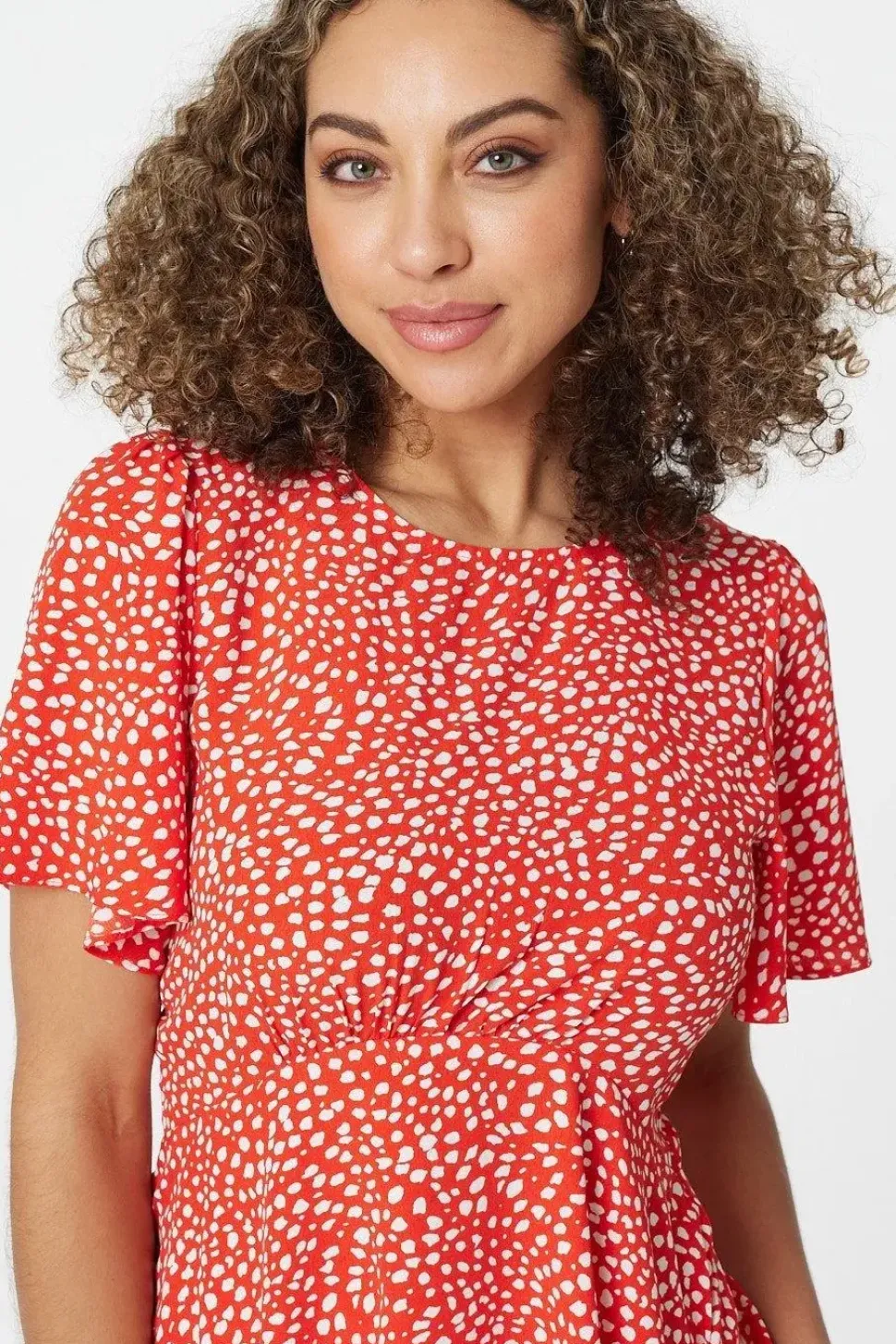 Polka Dot Peplum Blouse