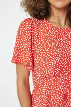 Polka Dot Peplum Blouse