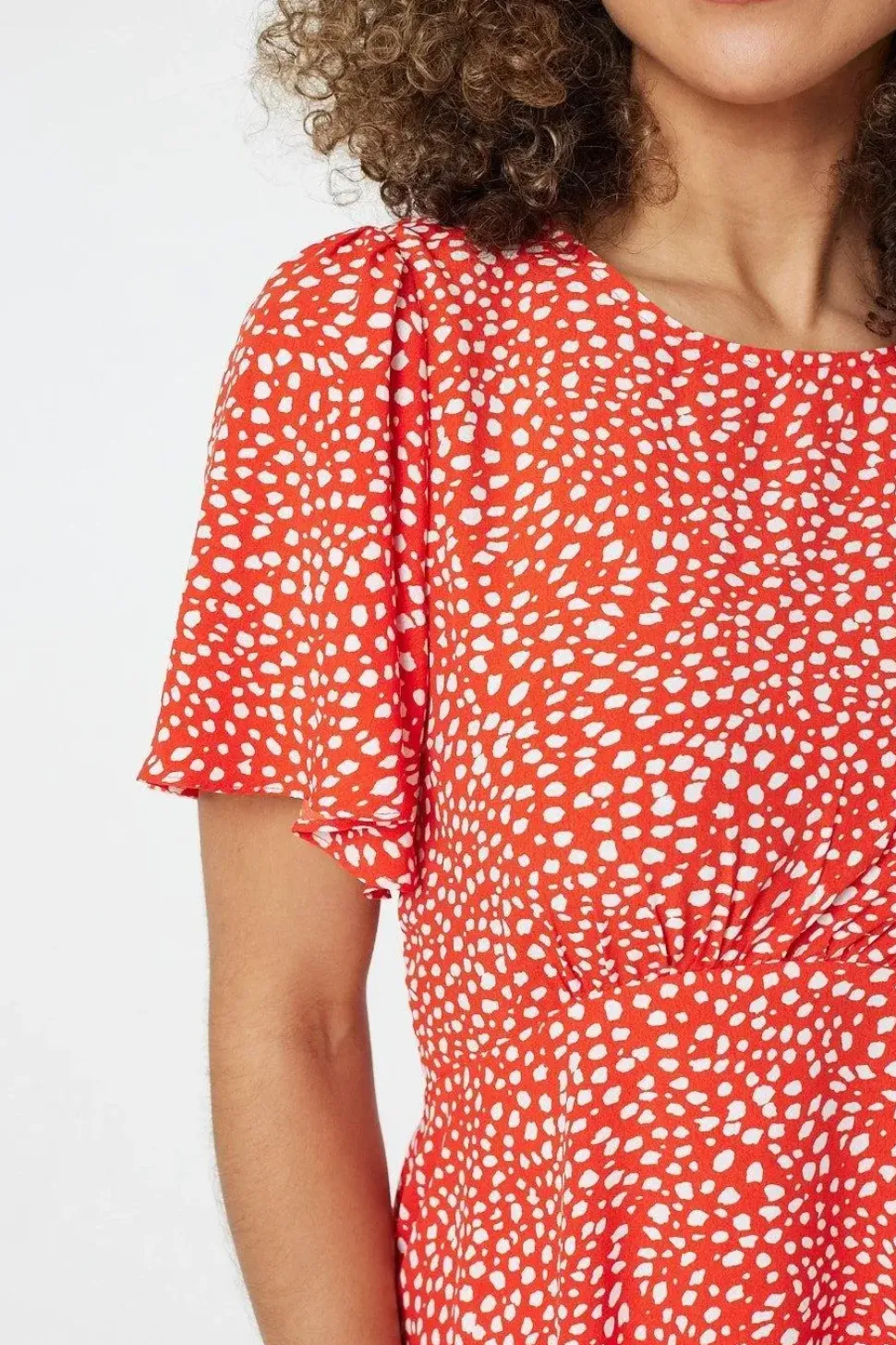 Polka Dot Peplum Blouse