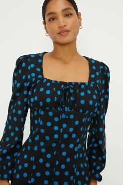 Spot Shirred Cuff Textured Long Sleeve Top