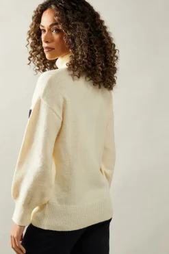 Star Front Roll Neck Jumper