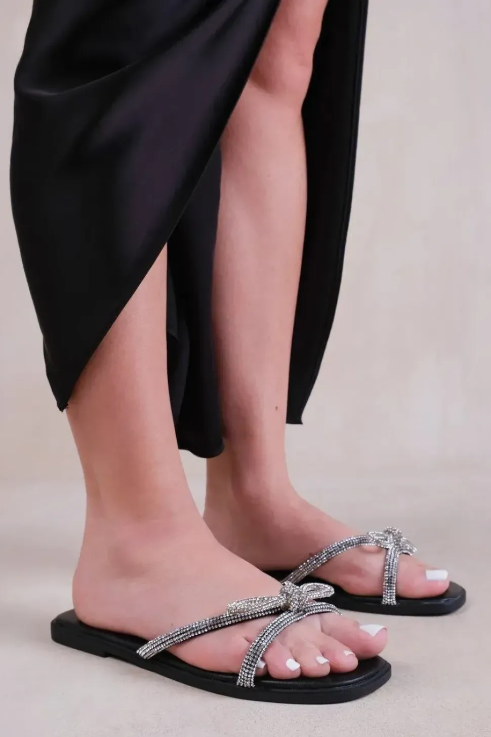 'Earth' Flat Slip On Sandals With Bow Diamante Detail